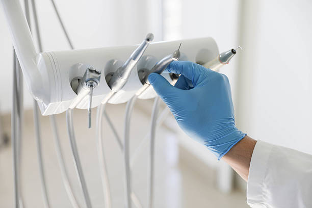 Professional Emergency Dentist technician working in Pikesville, MD